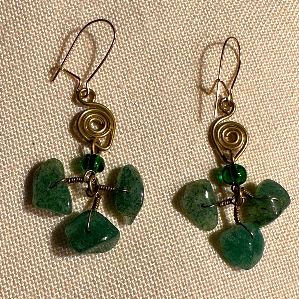 Green stones and gold earrings. Boho delicate